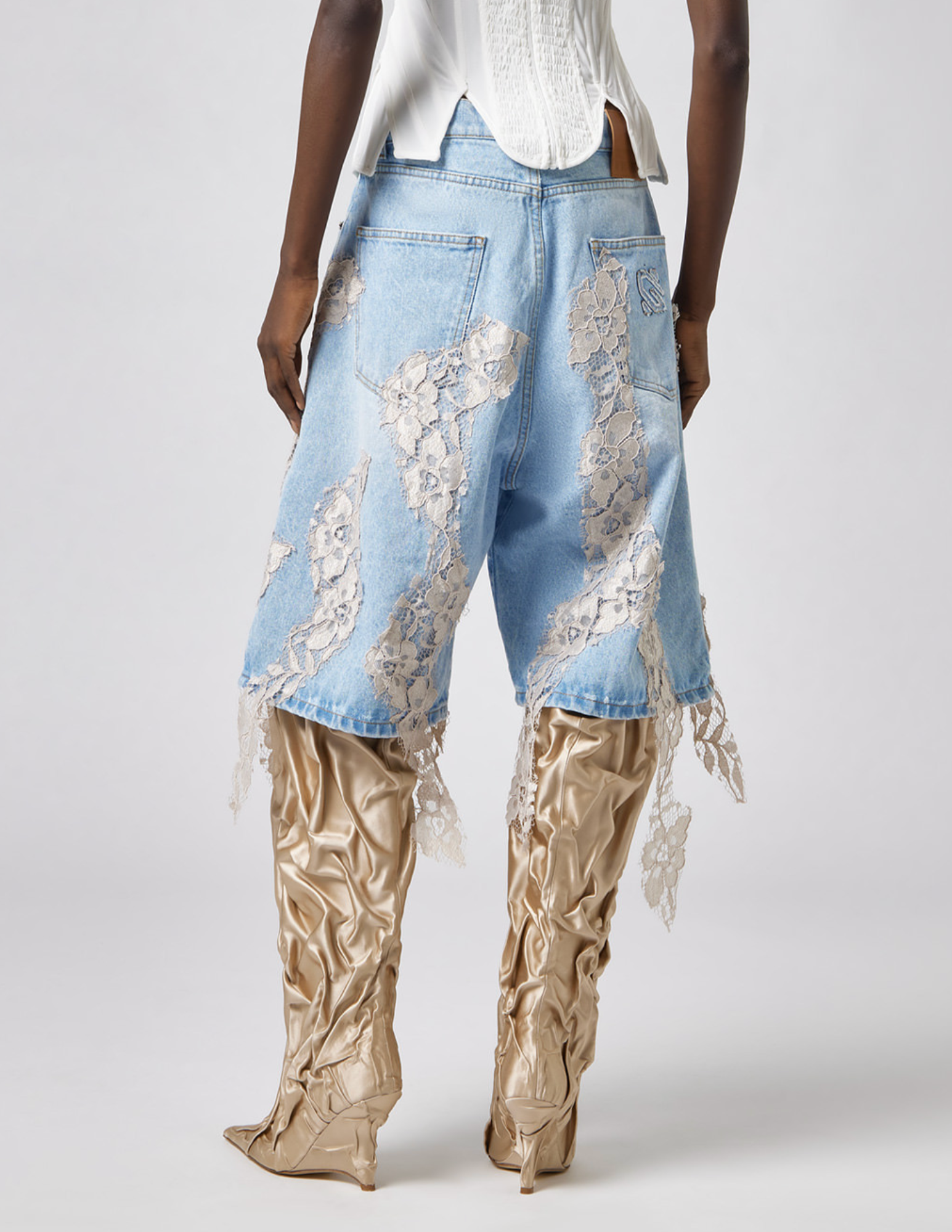 Back view of Giuseppe Di Morabito Lace Detail Denim Shorts Light Blue Nude