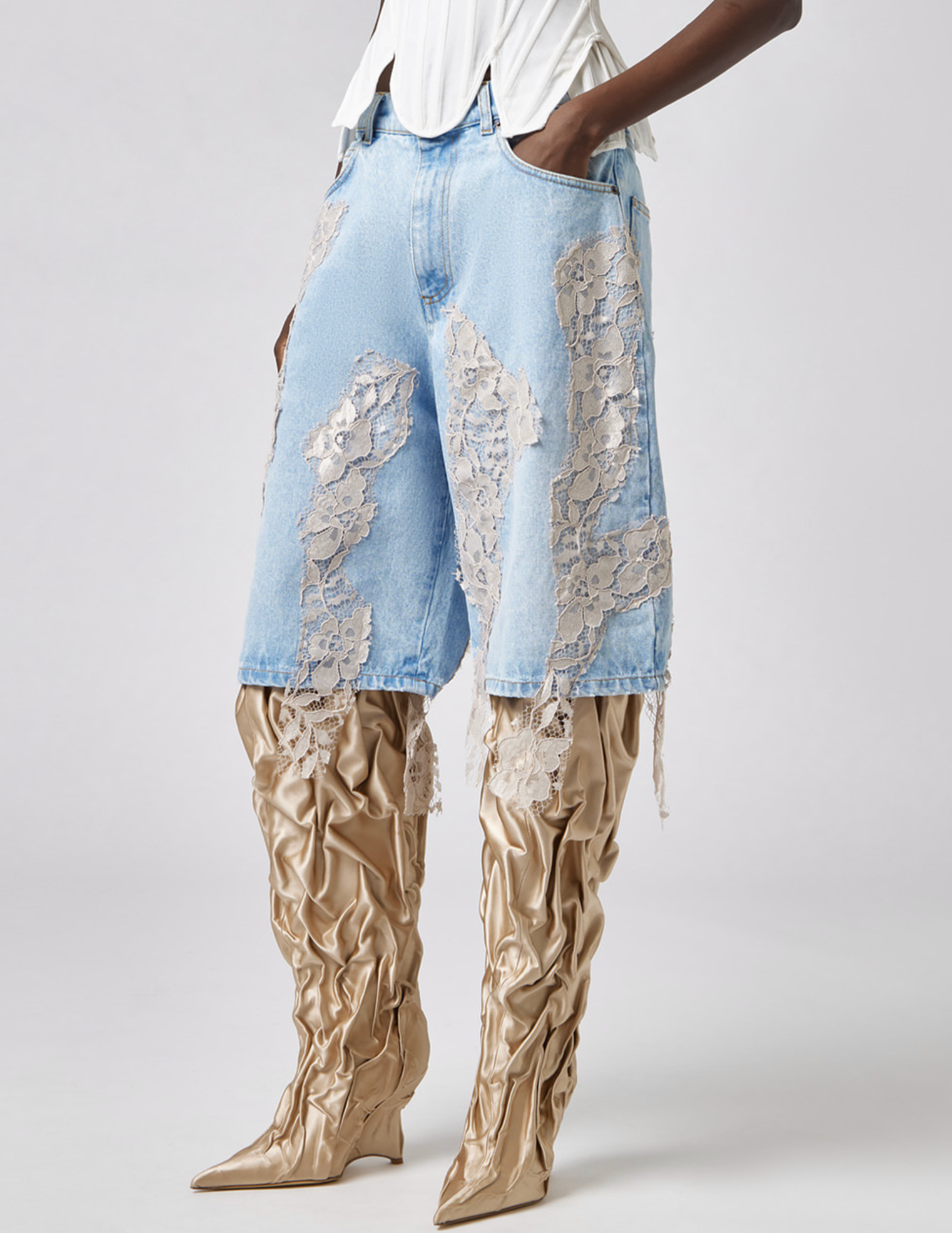 Side view of Giuseppe Di Morabito Lace Detail Denim Shorts Light Blue Nude