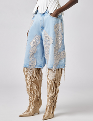 Side view of Giuseppe Di Morabito Lace Detail Denim Shorts Light Blue Nude
