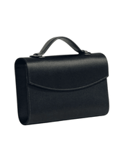 Angled view of Hunting Season black satin top handle clutch with structured design