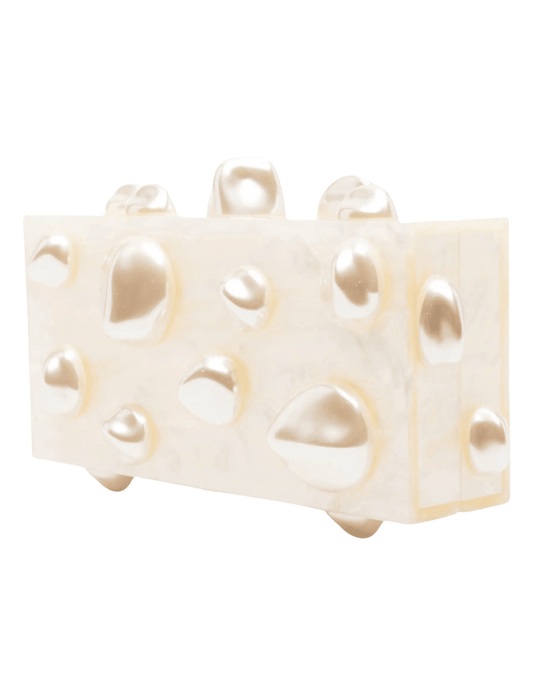 Designer ivory acrylic statement clutch with sculptural orb details