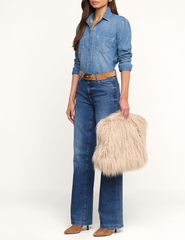 L'AGENCE Adelina Faux Fur Clutch in Biscuit styled with denim.