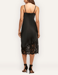 Back view of L'AGENCE Adrienne black silk midi dress with spaghetti straps and floral lace hem