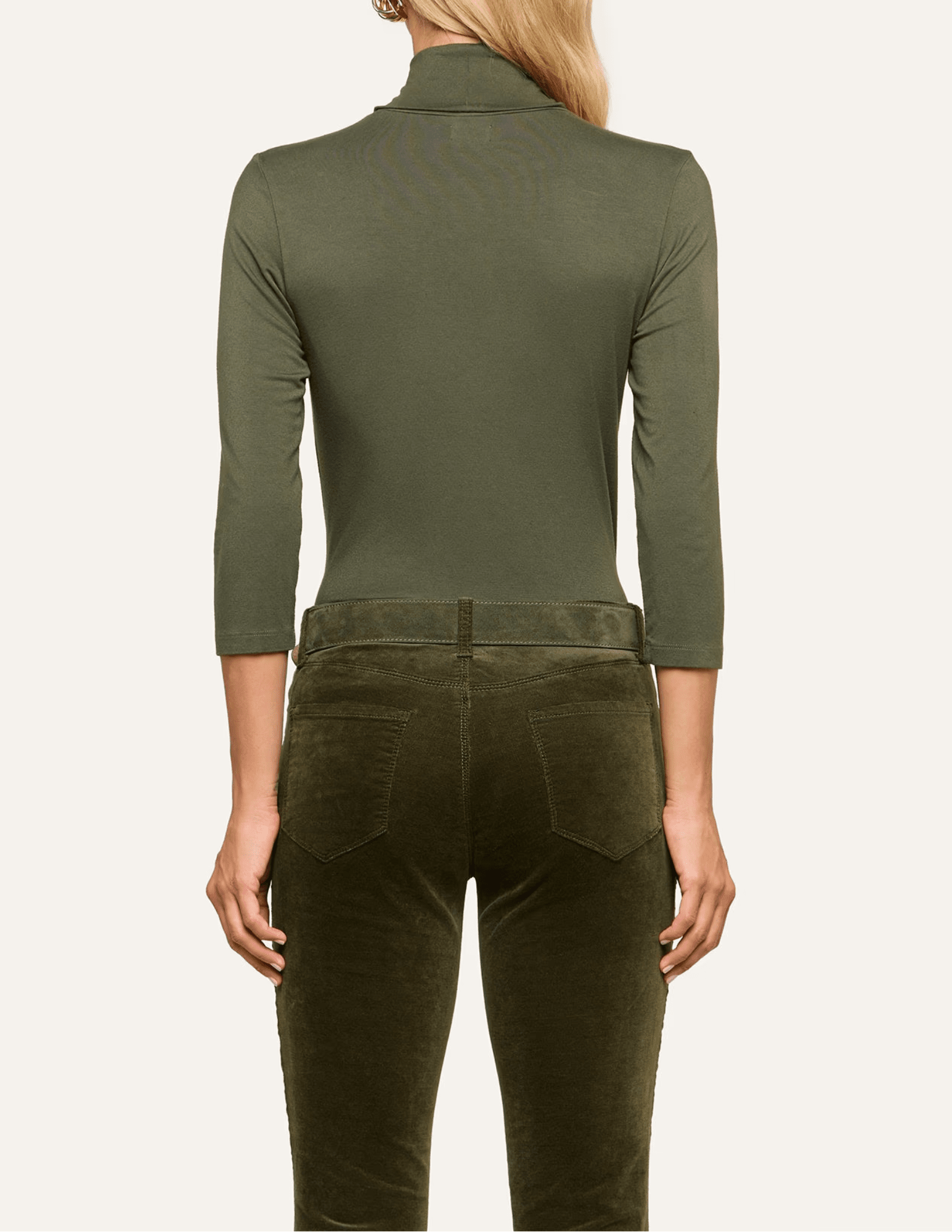 Back view of L'AGENCE Aja Army Green Turtleneck showcasing its fitted silhouette and three-quarter sleeves.