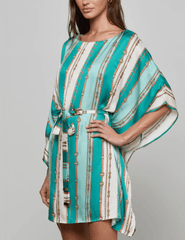 Side view of L’AGENCE Alia Cover-Up Tunic in Light Sage Belt Stripe on model