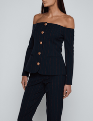 Side profile of Alice Off-Shoulder Blazer showing tailored fit and pinstripe detail