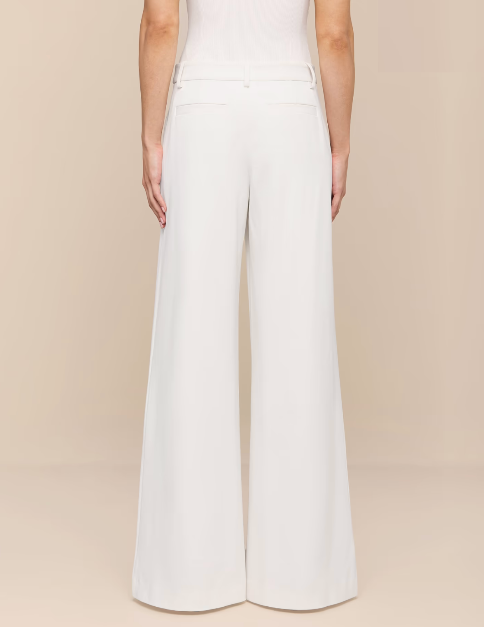 Back view of L'AGENCE Allanah white tailored trousers