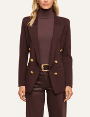 Model wearing L'AGENCE Amelia Knit Blazer in Dark Java and Gold.