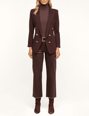 Full-length styling of L'AGENCE Amelia Knit Blazer in Dark Java and Gold.