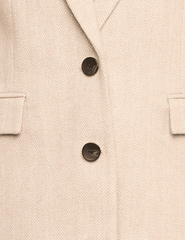 Button and fabric close up view of L'AGENCE Amelie Herringbone Blazer Cappuccino Ivory Tweed