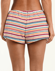 Back view of L’AGENCE Amiya terry hot short in multicolor watercolor stripe