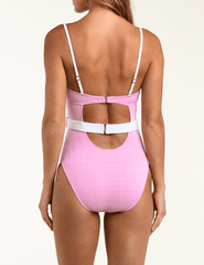 Back view of L’AGENCE Anastasia one-piece swimsuit in blush and white