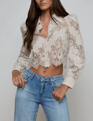 Front view of L’AGENCE Anita lace blouse with scalloped hem
