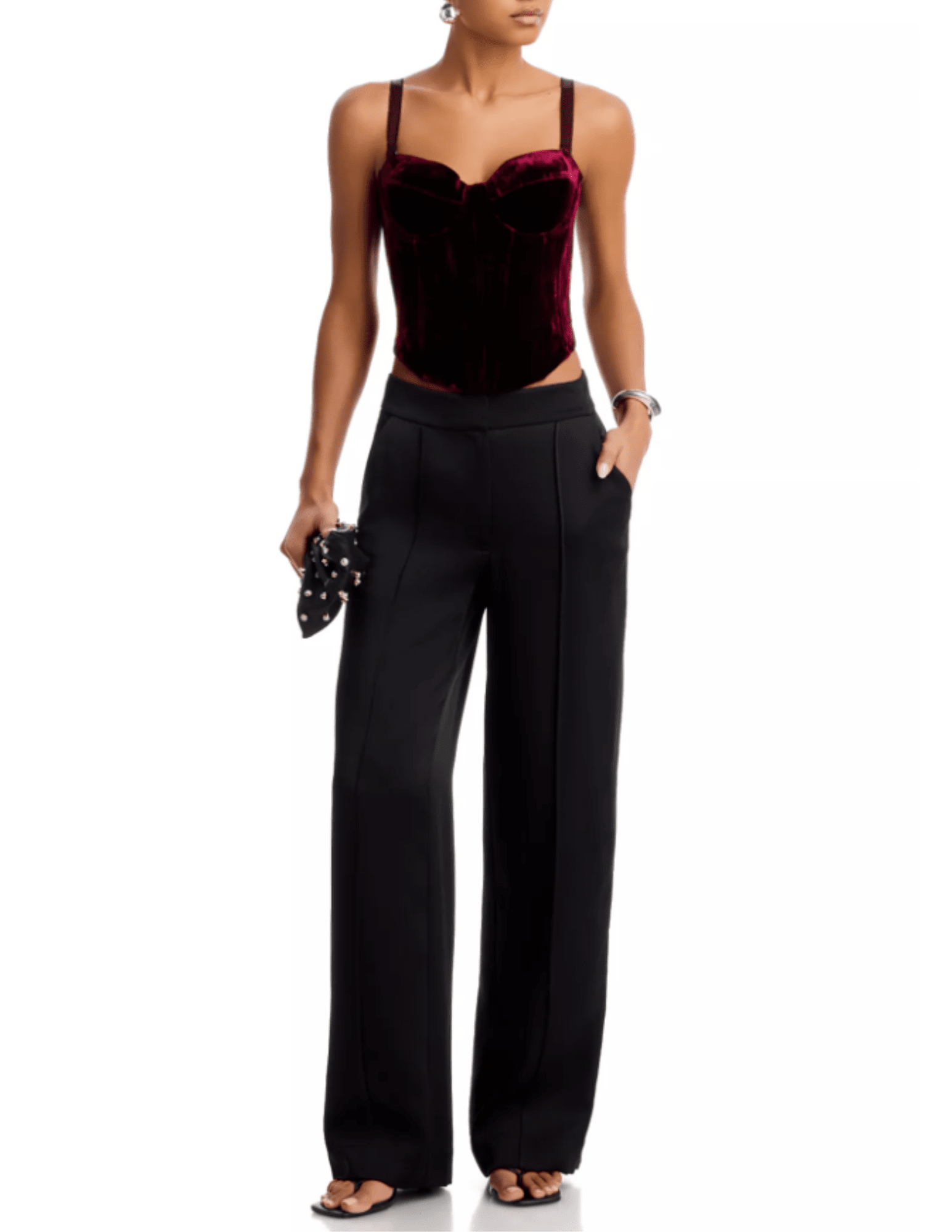 L'AGENCE Ariana Velvet Lace-Up Corset in Deep Port styled with black wide-leg trousers for eveningwear.