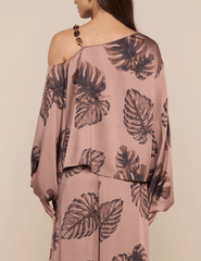 Back view of palm print blouse with chain detail