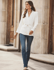 L’AGENCE ivory wrap blazer with waist tie editorial image