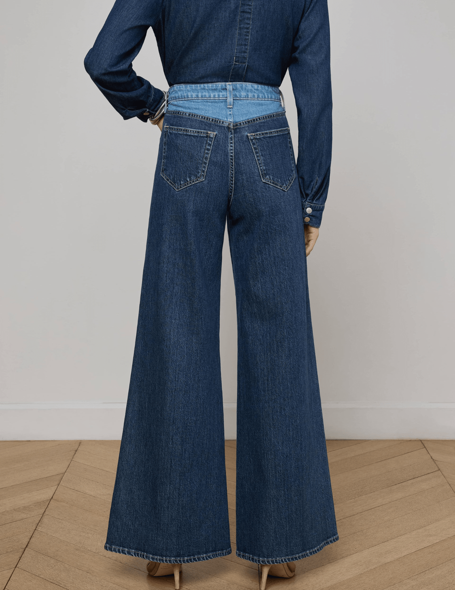 L’AGENCE Beau T-Seam wide leg jeans in Paso with high-rise waist and two-tone contrast back view

