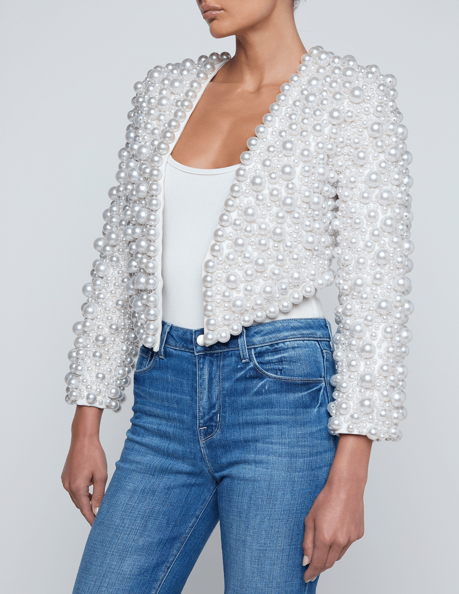 Cropped ivory jacket with pearls and structured shoulders by L’AGENCE
