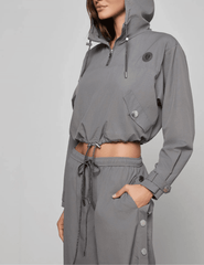 Side view of L’AGENCE Bronwyn hooded windbreaker