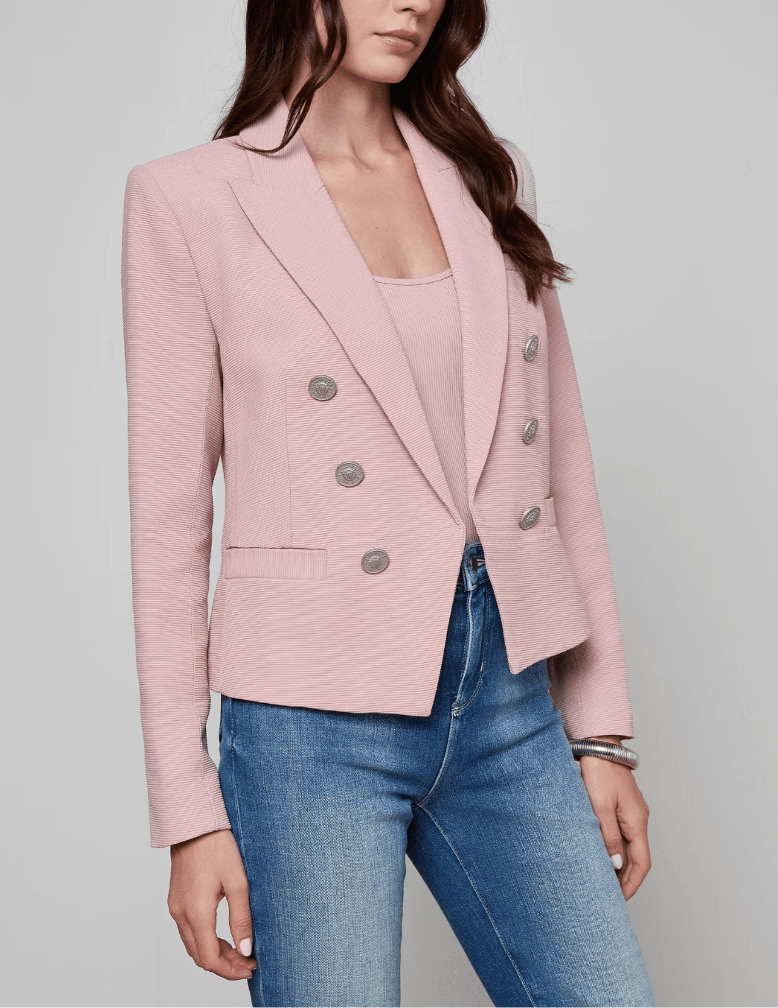 Side view of L’AGENCE Brooke blazer showing tailored cropped fit