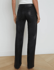 L'AGENCE Clayton high rise wide leg coated jeans in Black Coated, sleek women’s denim with a glossy finish and relaxed wide leg silhouette back model view