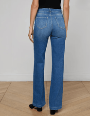 Back view of L’AGENCE Clayton wide leg jeans with contoured waistband