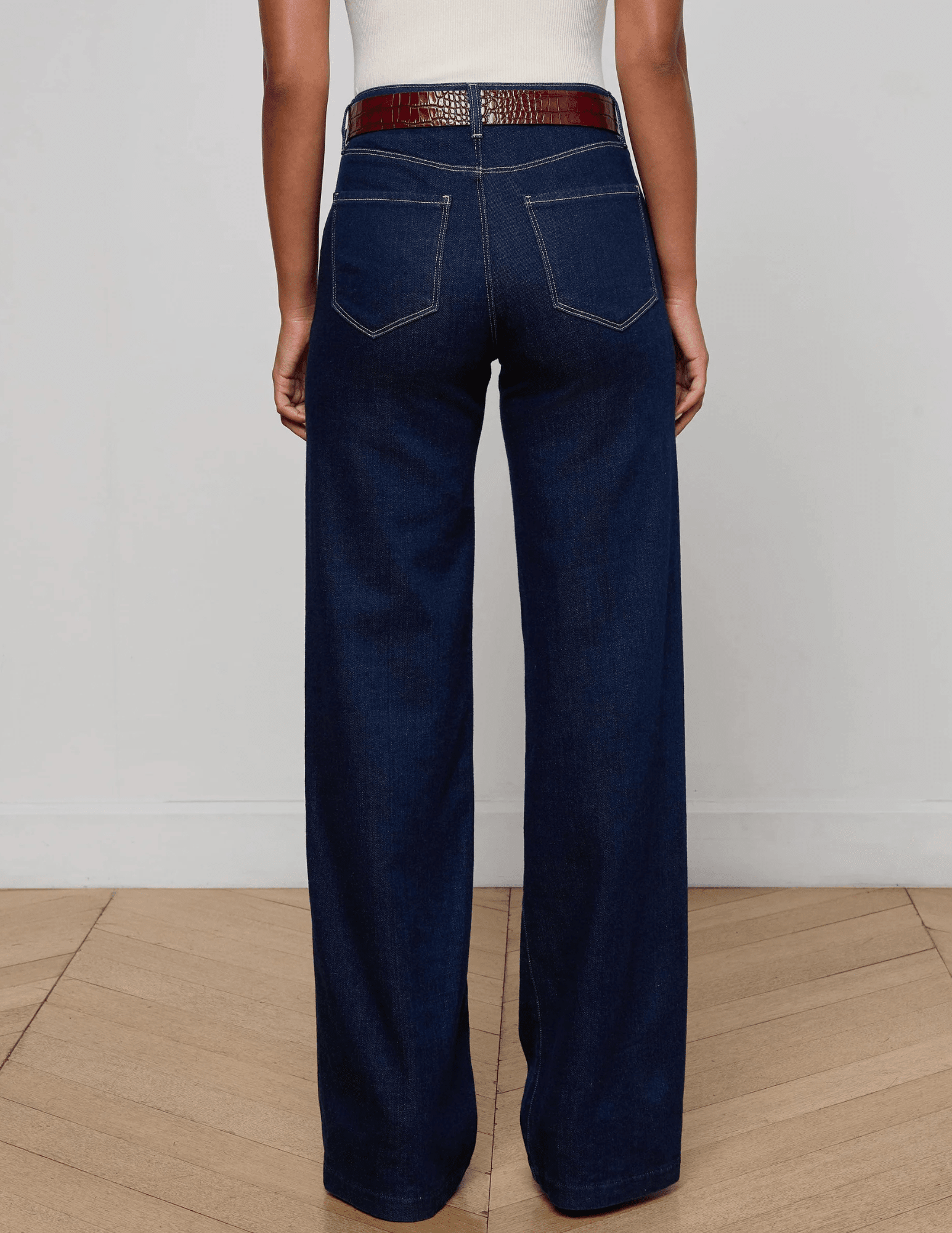 Back view of L’AGENCE Clayton Wide Leg Jeans in medium-blue Koval wash.