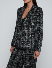 Side view of L’AGENCE Colin Tweed Double Breasted Blazer in black ivory.