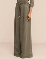 Side view of L'AGENCE Connie wide-leg trousers in Smokey Olive