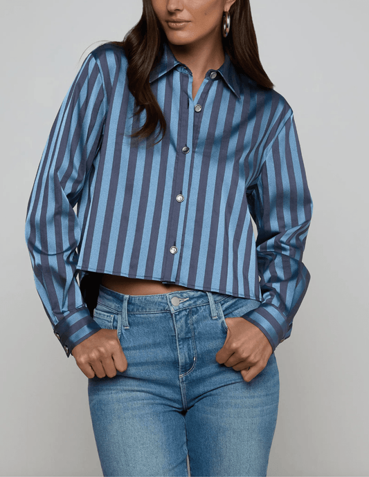 Front view of blue striped satin high-low blouse