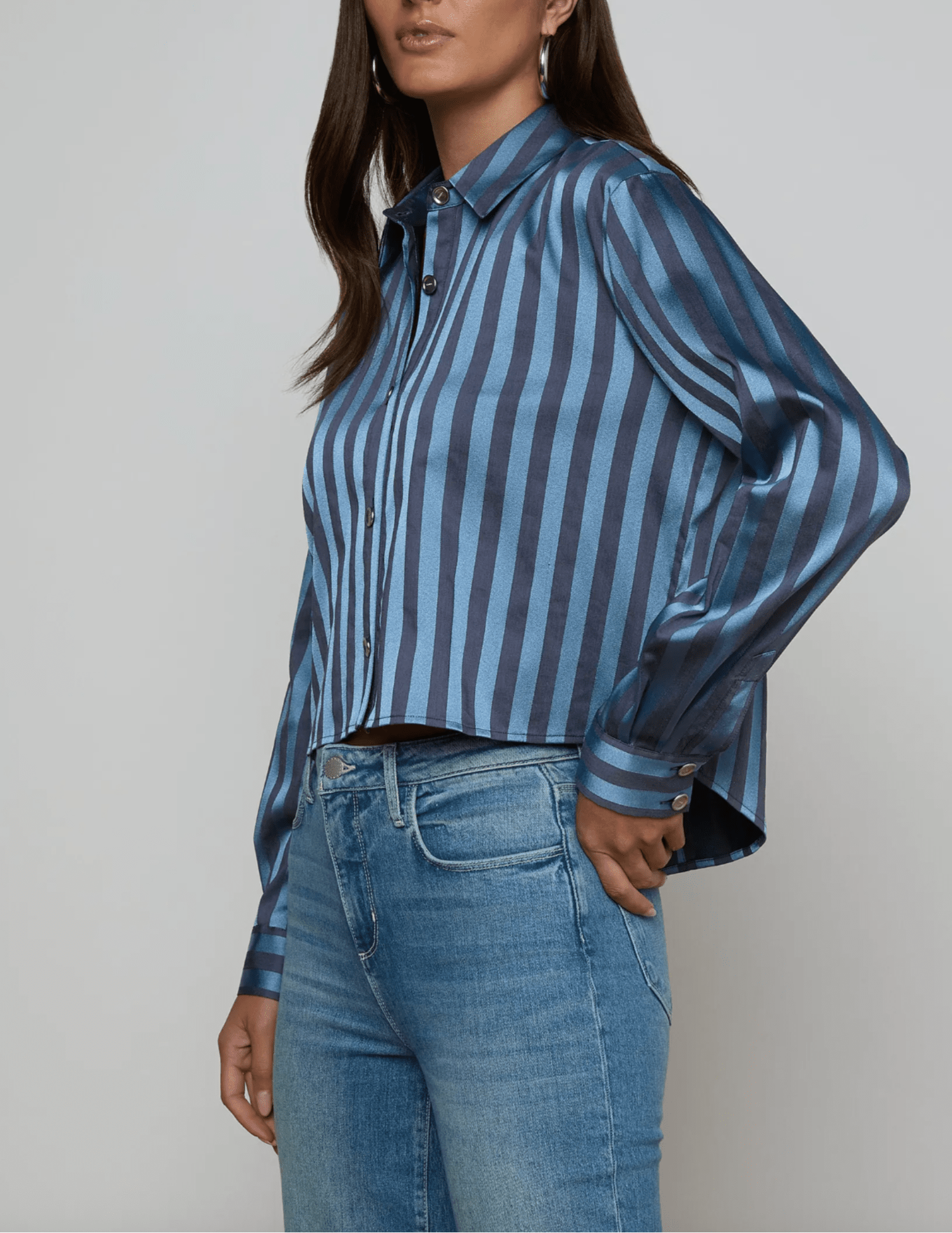 Side view of cropped striped button-down blouse
