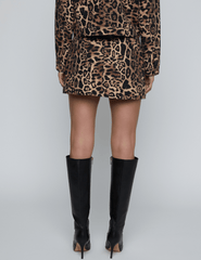 Back view of L’AGENCE Cyra Leopard Print Mini Skirt in 100% cotton.
