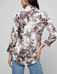 Back view of L’AGENCE Dani silk blouse in butterfly jungle print