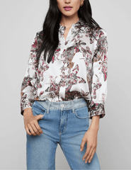 Front view of L’AGENCE Dani silk blouse in butterfly jungle print