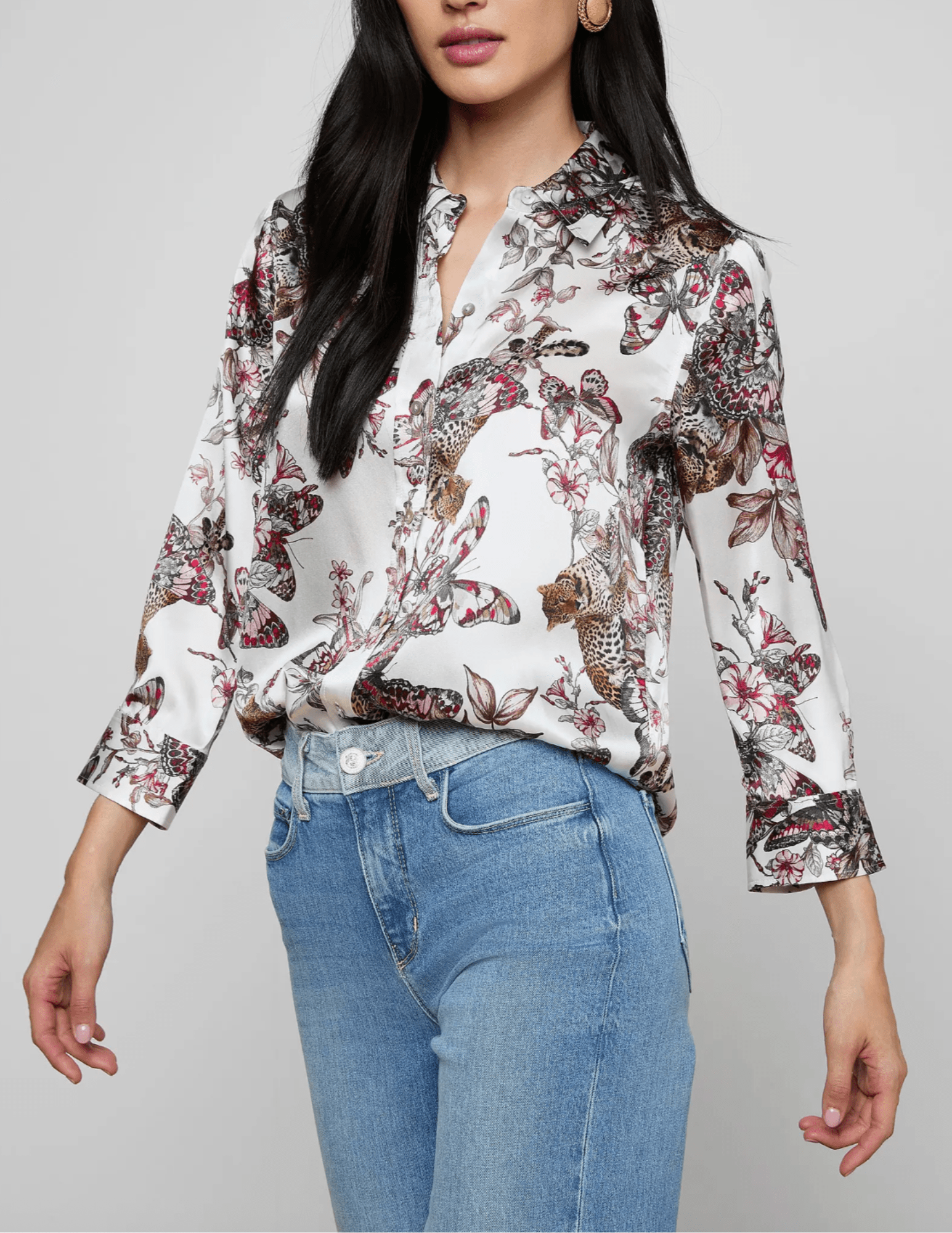 Side view of L’AGENCE Dani silk blouse in butterfly jungle print