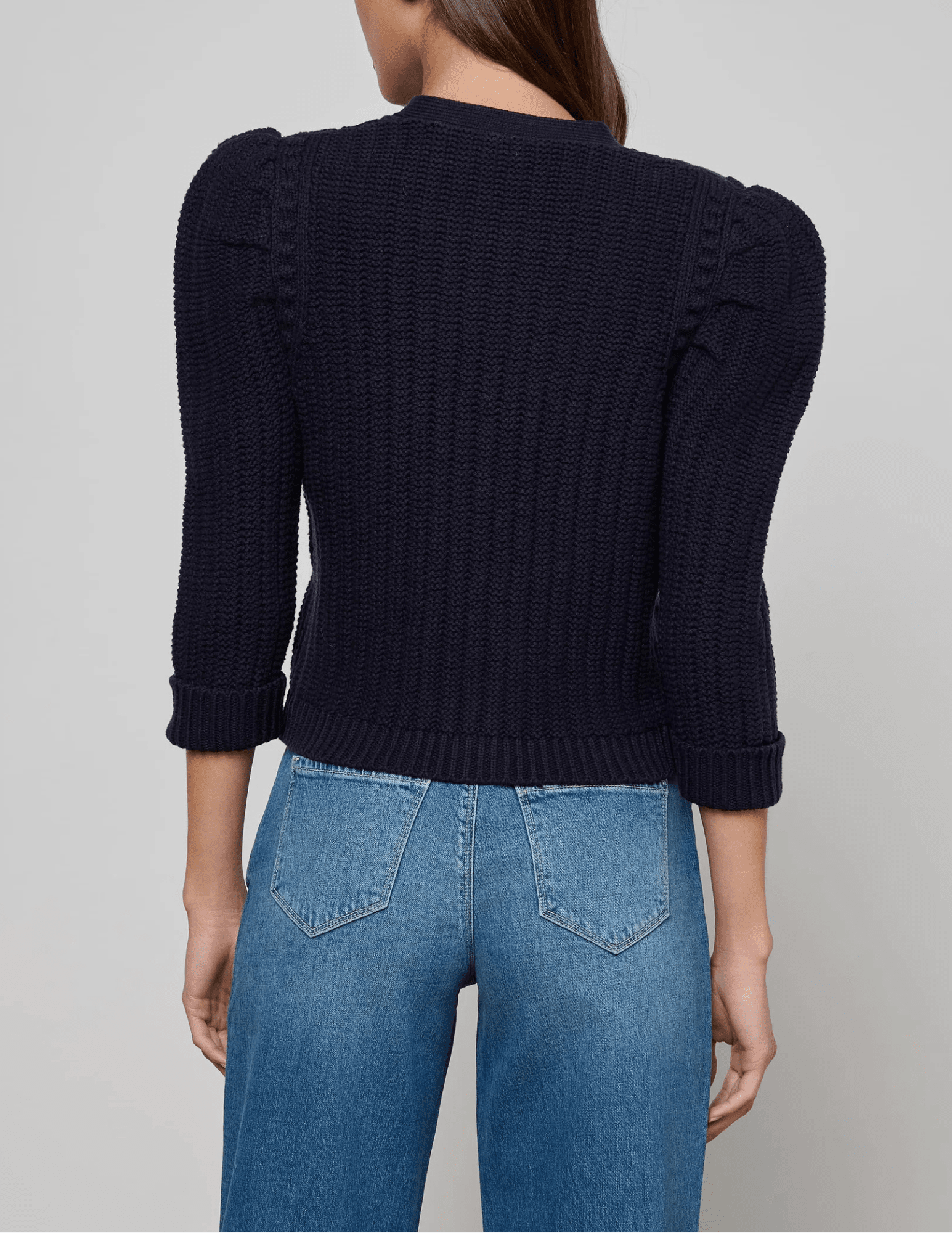 Back view of L’AGENCE Delli Cropped Textured Cardigan showing cropped hem.