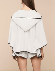 Back view of LAGENCE Demeter white hooded poncho cover up