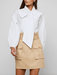 Front view of L’AGENCE Deon white blouse with blouson sleeves