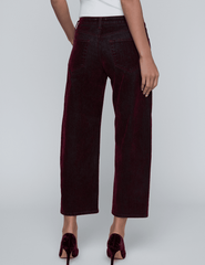 Back view of L’AGENCE Dolores Jean in Bordeaux with cropped hem