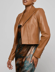 Side view of L’AGENCE Dulcie Leather Blazer featuring whipstitch details