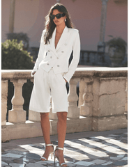 Model wearing L'AGENCE Emerson ivory double-breasted blazer