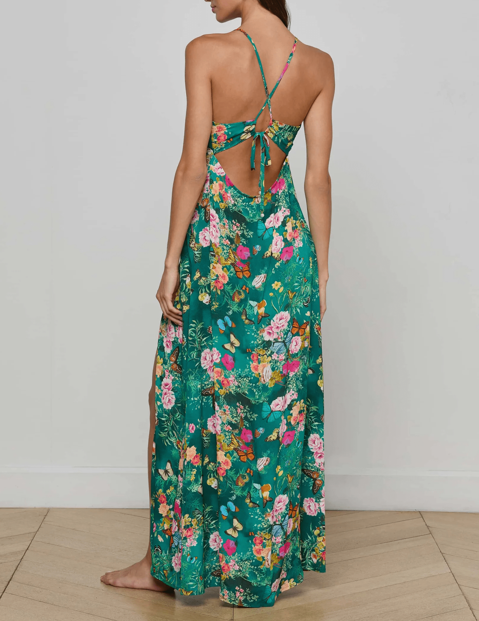 Back view of L’AGENCE Geneva Halter Maxi Dress with lace-up halter ties