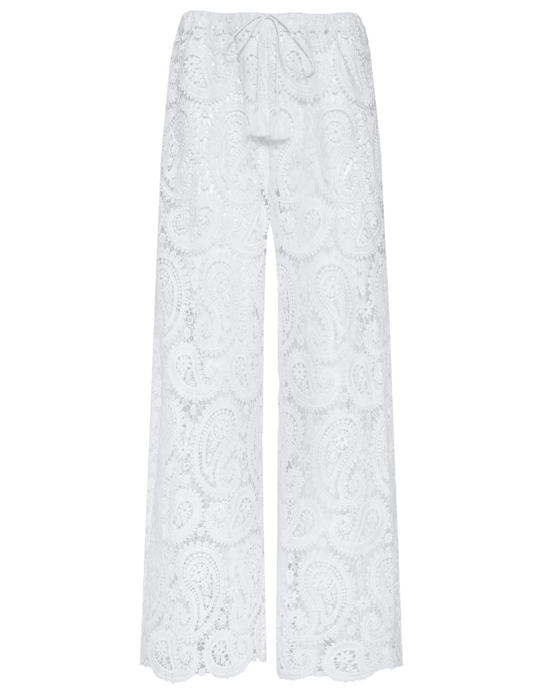 Model wearing L’AGENCE Geraldine white crochet cover-up pants
