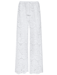 Model wearing L’AGENCE Geraldine white crochet cover-up pants
