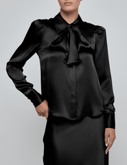 Front of L’AGENCE Honey tie neck silk blouse in black