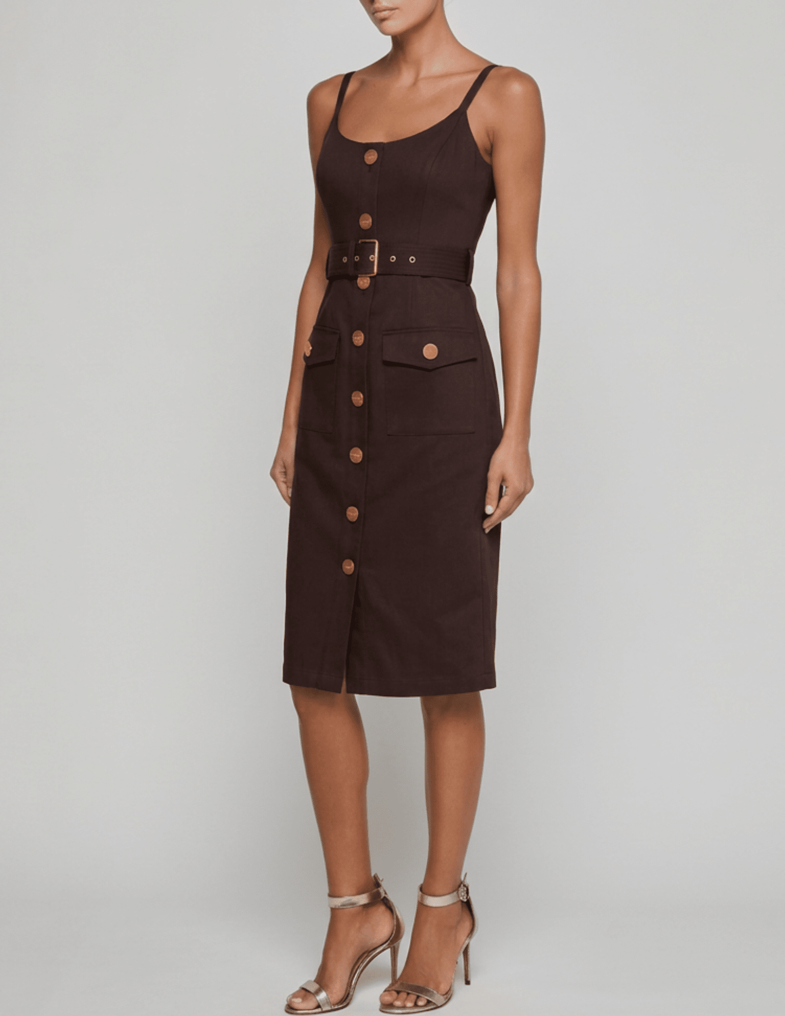 Angled view of L'AGENCE Ida dark brown sleeveless midi dress with front flap pockets