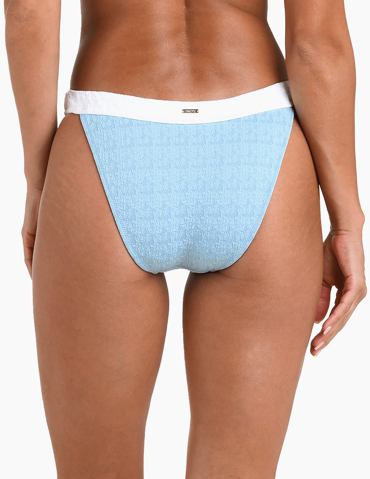 Side view of L’AGENCE Jean Bikini Bottom showing high-leg moderate coverage