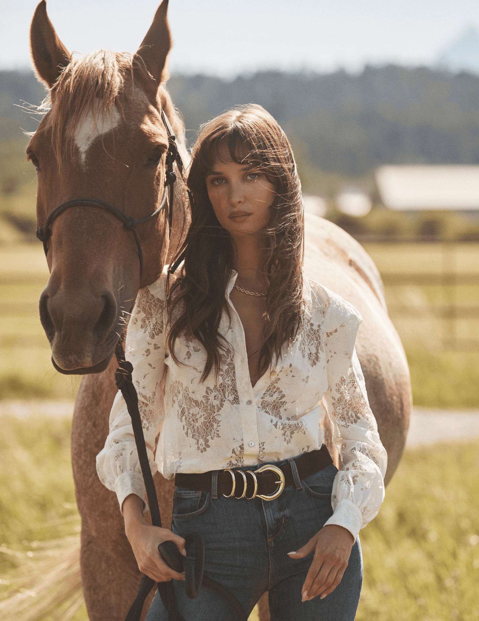 Editorial image of L’AGENCE Jenica Chevron Lace Blouse in Ivory