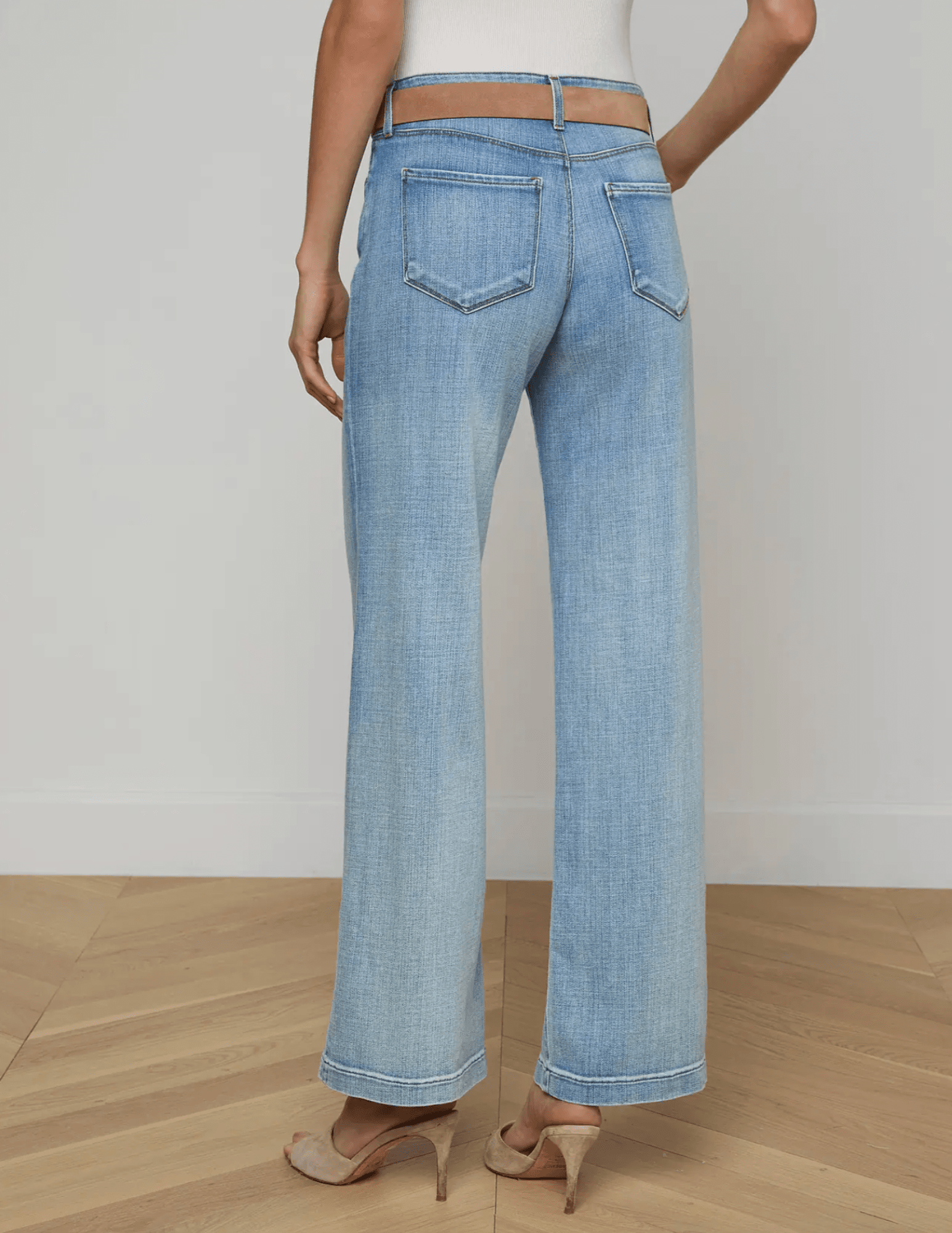 Back view of L'AGENCE Joanne low rise wide leg jeans in light wash Dry Ice denim