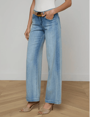 Side view of L'AGENCE Joanne low rise wide leg jeans in light wash Dry Ice denim